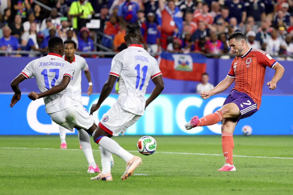 FOXBOROUGH, MASSACHUSETTS - JUNE 13: John McGinn #7 of Scotland scores his team's first goal during the FIFA World Cup 2026 Group C match between Haiti and Scotland at Boston Stadium on June 13, 2026 in Foxborough, Massachusetts. Justin Setterfield/Getty Images/AFP (Photo by Justin Setterfield / GETTY IMAGES NORTH AMERICA / Getty Images via AFP)