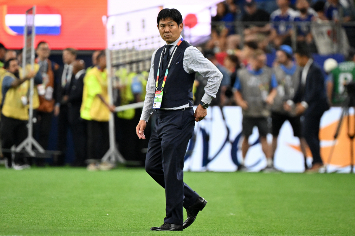 epa13037325 Japan's head coach Hajime Moriyasu walks on the pitch after the FIFA World Cup 2026 group stage match Netherlands against Japan, in Dallas, Texas, USA, 14 June 2026. EPA/ALBERT PENA