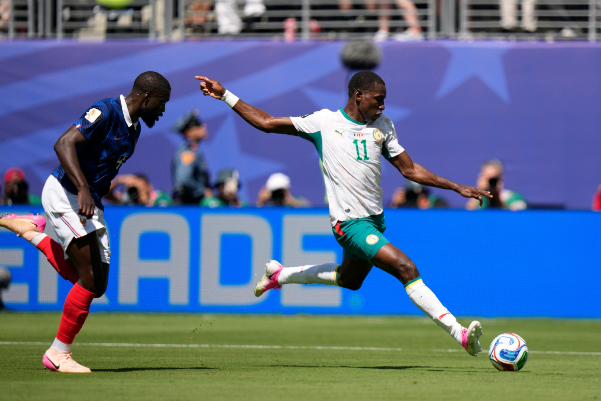 Senegal's Nicolas Jackson (11) makes an attempt to score during the World Cup Group I soccer match between France and Senegal in East Rutherford, N.J., near New York, Tuesday, June 16, 2026. (AP Photo/Frank Franklin II)