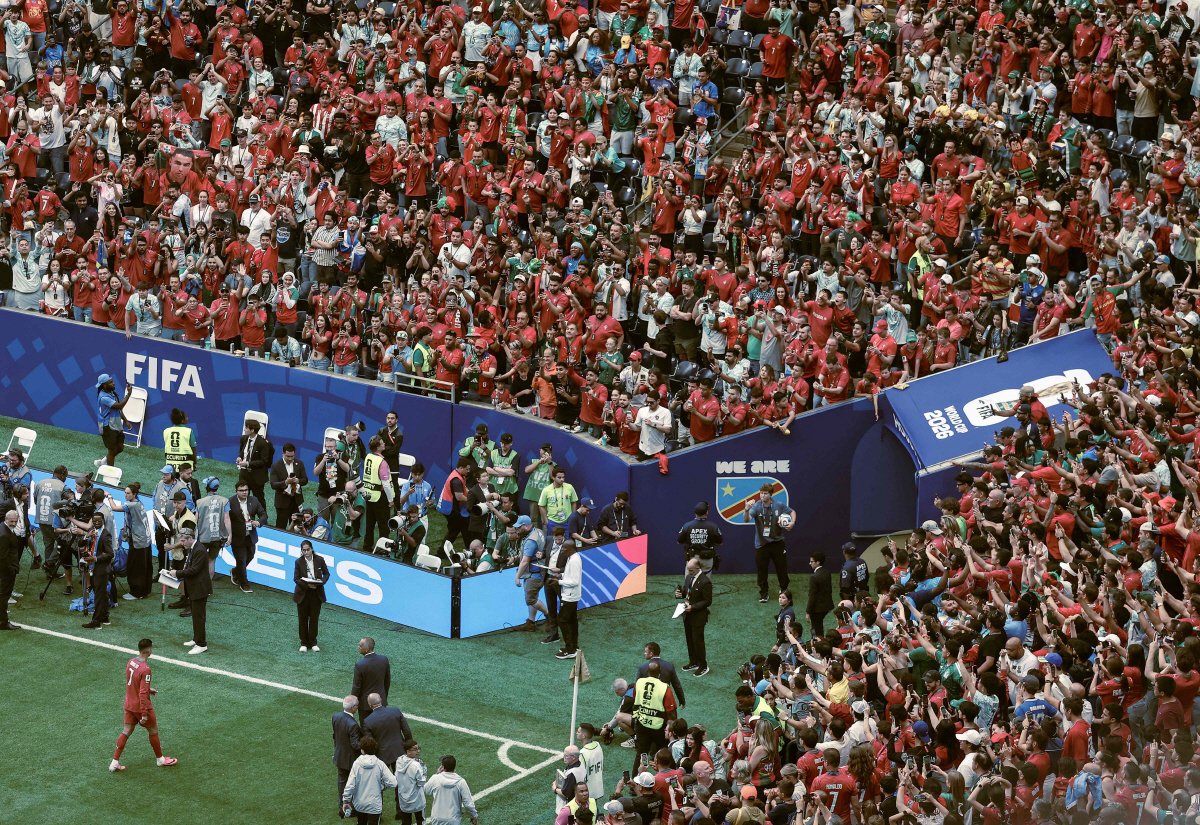 HOUSTON, TEXAS - JUNE 17: (EDITOR'S NOTE: This image has been digitally enhanced) Cristiano Ronaldo #7 of Portugal leaves the field of play after the FIFA World Cup 2026 Group K match between Portugal and Congo DR at Houston Stadium on June 17, 2026 in Houston, Texas. Lars Baron/Getty Images/AFP (Photo by Lars Baron / GETTY IMAGES NORTH AMERICA / Getty Images via AFP)