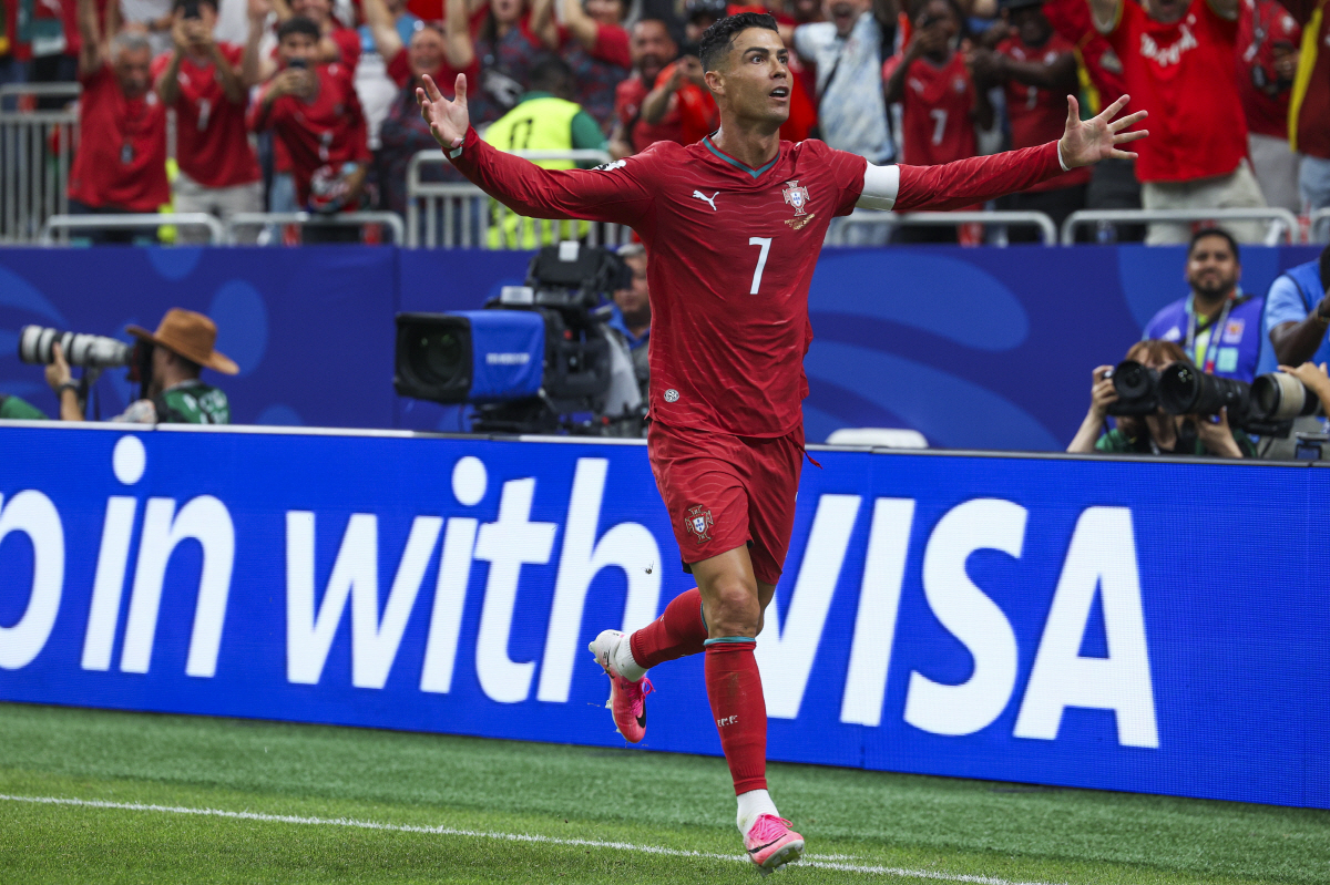 epa13058878 Portugal's Cristiano Ronaldo celebrates a goal against Uzbekistan during the FIFA World Cup 2026 Group K soccer match held at Houston Stadium, Texas, USA, 23 June 2026. EPA/MIGUEL A. LOPES