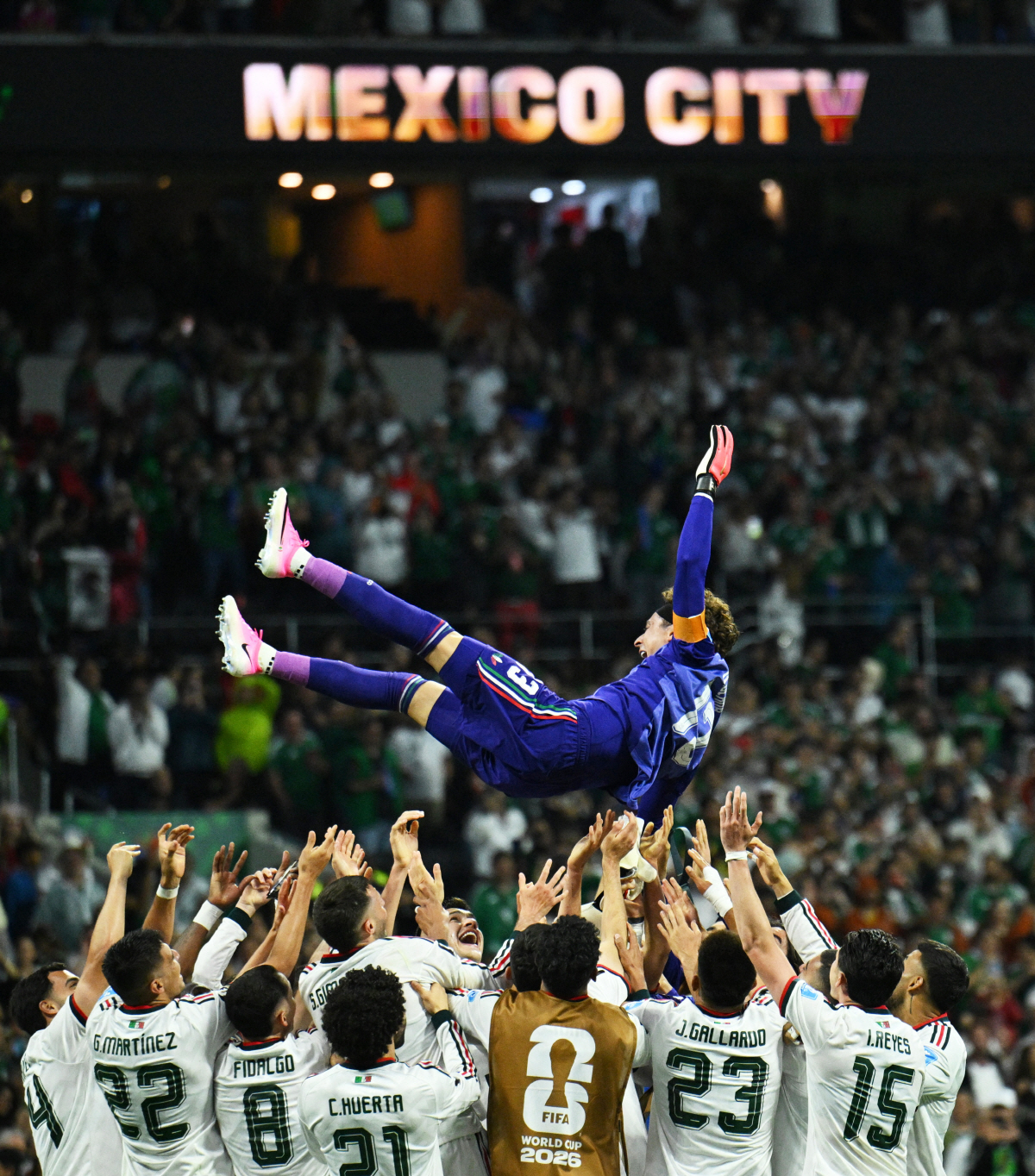 Soccer Football - FIFA World Cup 2026 - Group A - Czech Republic v Mexico - Estadio Azteca, Mexico City, Mexico - June 24, 2026 Mexico players throw Guillermo Ochoa in the air as they celebrate his first appearance in his sixth world cup REUTERS/Annegret Hilse