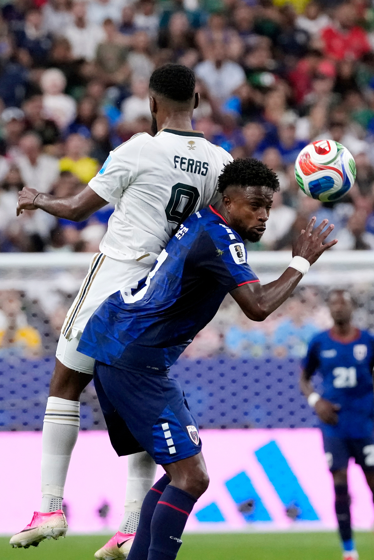Saudi Arabia's Feras Albrikan, left, and Cape Verde's Diney Borges collide as they try to head the ball during the second half of the World Cup Group H soccer match in Houston, Friday, June 26, 2026. (AP Photo/David J. Phillip)