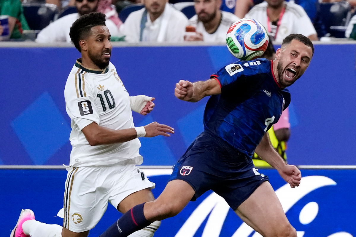 Cape Verde's Pico Lopes (4) loses control of the ball against Saudi Arabia's Salem Aldawsari (10) during the second half of the World Cup Group H soccer match in Houston, Friday, June 26, 2026. (AP Photo/David J. Phillip)