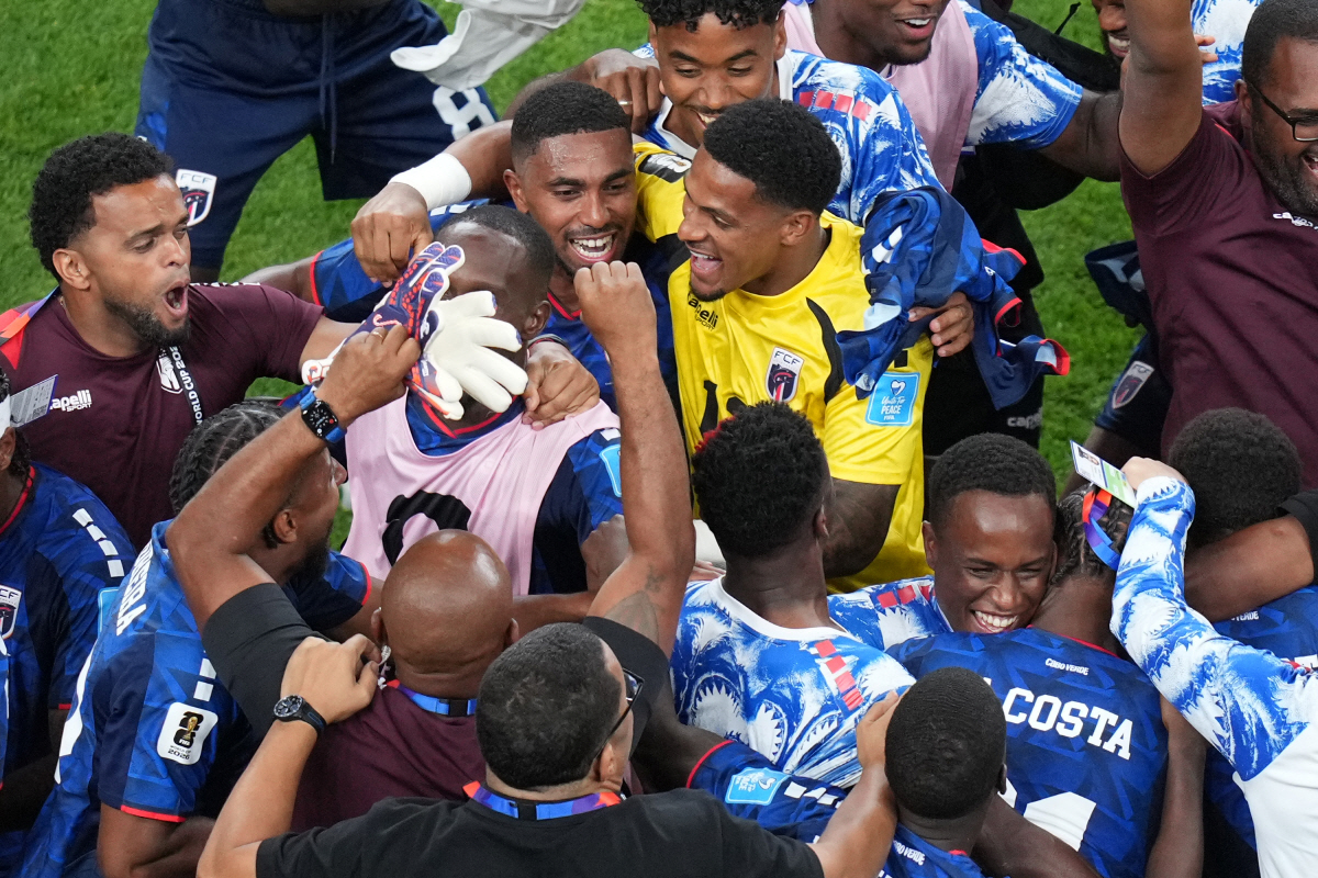 Cape Verde goalkeeper Marcio Rosa (12) celebrates with teammates after advancing during the World Cup Group H soccer match between Cape Verde and Saudi Arabia in Houston, Friday, June 26, 2026. (AP Photo/Eric Gay) CORRECTION: Corrects ID to Cape Verde goalkeeper Marcio Rosa (12), not Cape Verde goalkeeper Vozinha (1). CORRECTION: CORRECTS ID TO CAPE VERDE GOALKEEPER MARCIO ROSA (12), NOT CAPE VERDE GOALKEEPER VOZINHA (1).