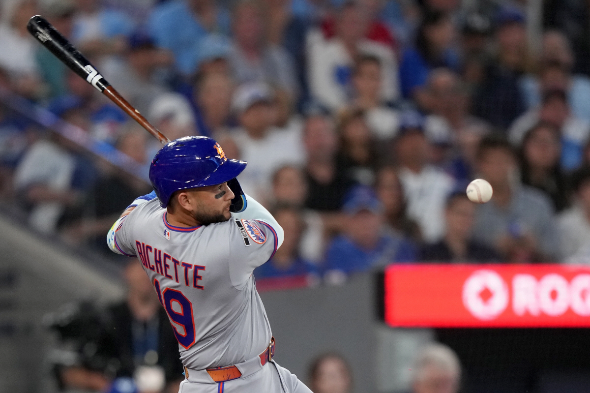 New York Mets' Bo Bichette watches his infield out during the eighth inning of a baseball game against the Toronto Blue Jays in Toronto, Monday, June 29, 2026. (Nathan Denette/The Canadian Press via AP) MANDATORY CREDIT