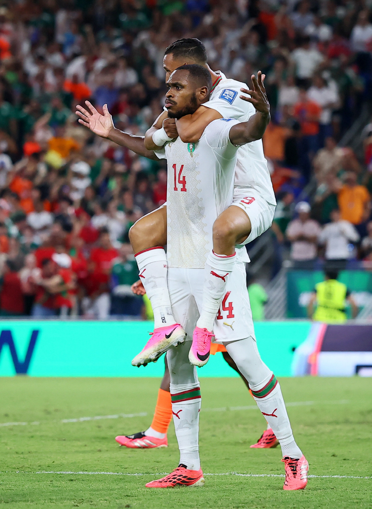 Soccer Football - FIFA World Cup 2026 - Round of 32 - Netherlands v Morocco - Estadio Monterrey, Monterrey, Mexico - June 29, 2026 Morocco's Issa Diop celebrates scoring their first goal with Soufiane Rahimi REUTERS/Eloisa Sanchez