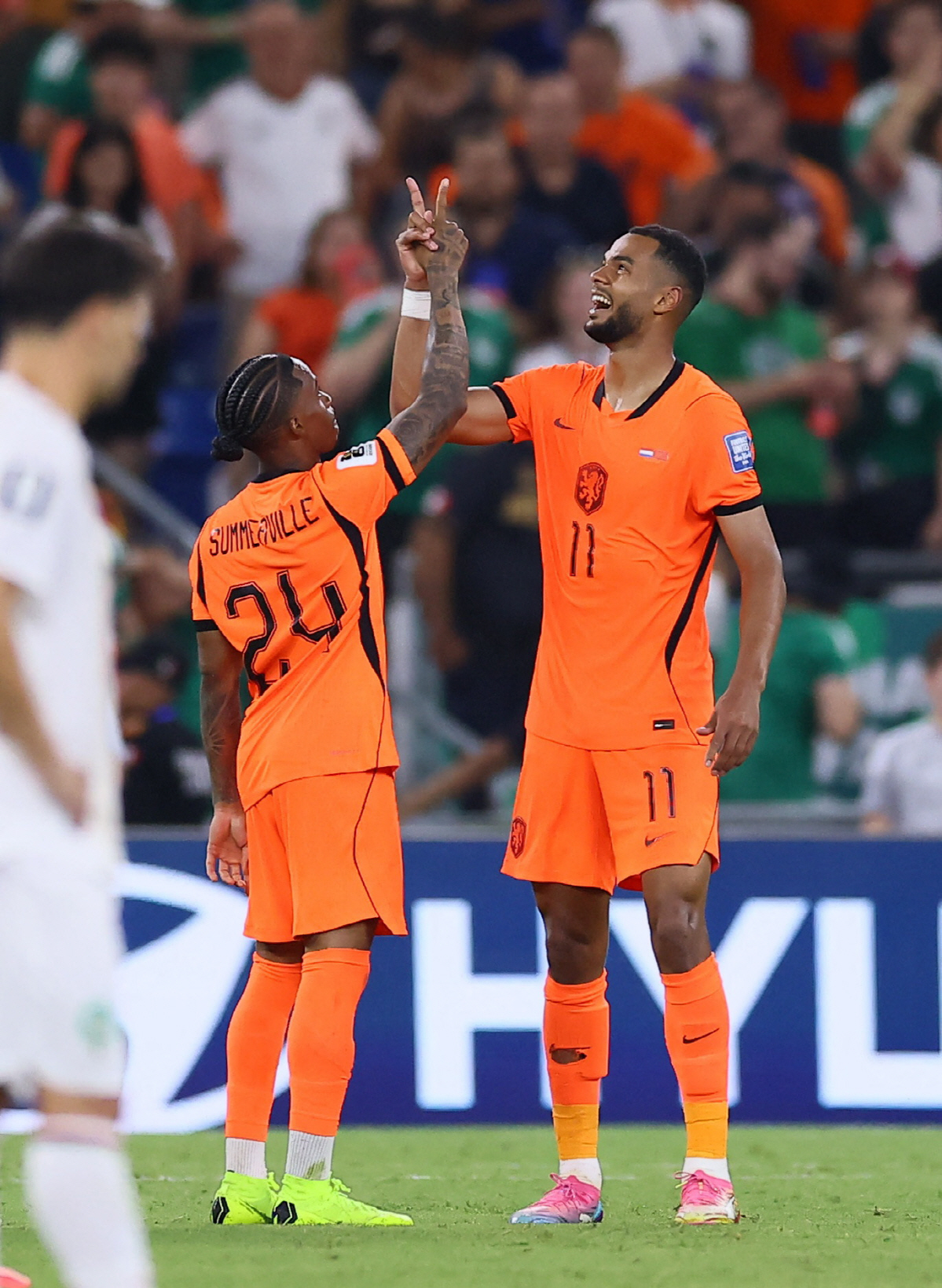 Soccer Football - FIFA World Cup 2026 - Round of 32 - Netherlands v Morocco - Estadio Monterrey, Monterrey, Mexico - June 29, 2026 Netherlands' Cody Gakpo celebrates scoring their first goal with Crysencio Summerville REUTERS/Eloisa Sanchez