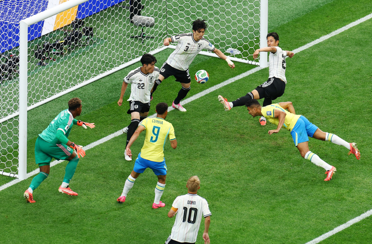 Soccer Football - FIFA World Cup 2026 - Round of 32 - Brazil v Japan - Houston Stadium, Houston, Texas, U.S. - June 29, 2026 Brazil's Casemiro heads at goal before before Japan's Takehiro Tomiyasu clears the ball off the line REUTERS/Pedro Nunes
