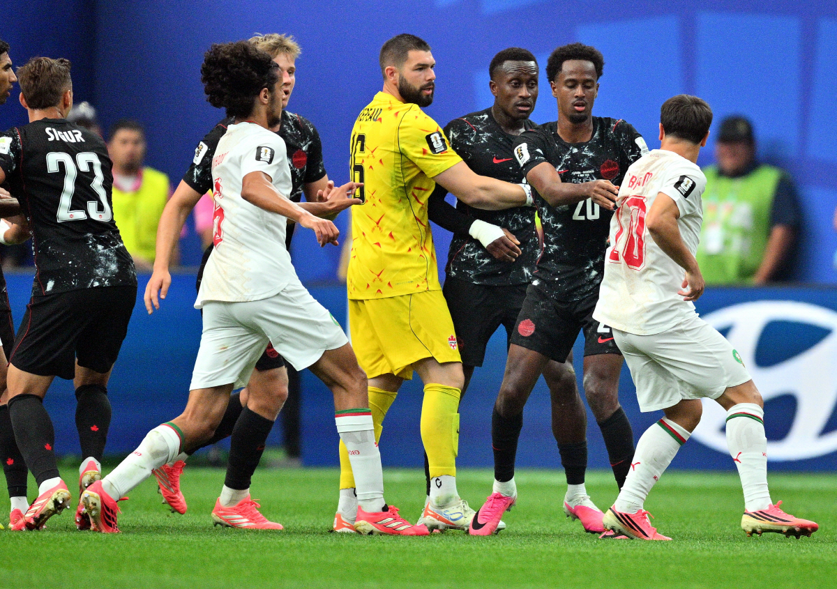 epa13086815 Players scuffle during the FIFA World Cup 2026 Round of 16 match Canada against Morocco, in Houston, USA, 04 July 2026. EPA/SAM WASSON
