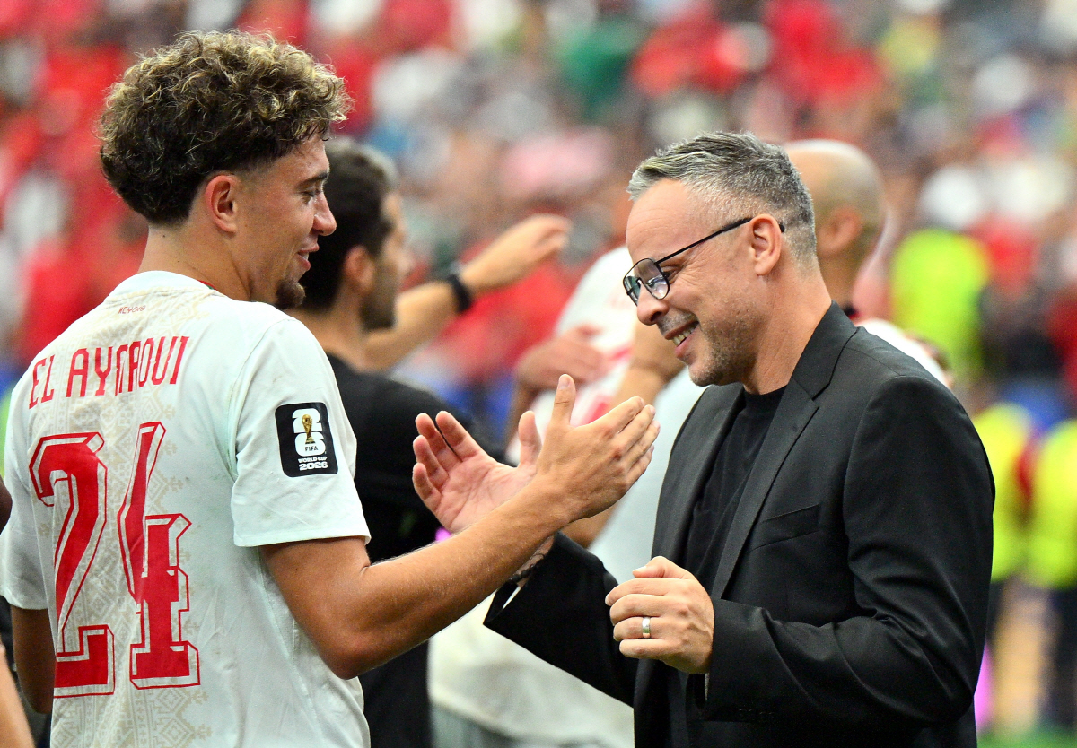 epa13087281 Morocco's head coach Mohamed Ouahbi (R) reacts with Neil El Aynaoui of Morocco after the FIFA World Cup 2026 Round of 16 match Canada against Morocco, in Houston, USA, 04 July 2026. EPA/SAM WASSON