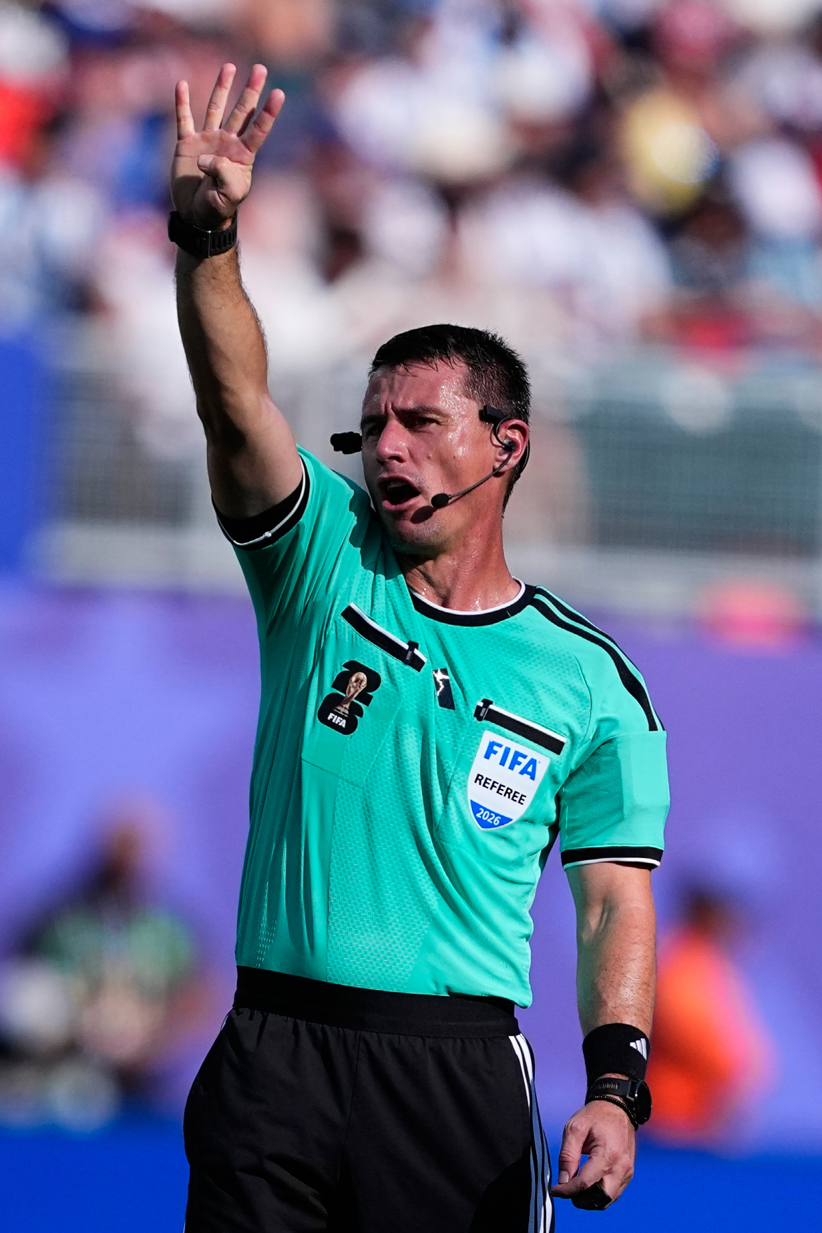 Referee Ilgiz Tantashev of Uzbekistan gestures during the World Cup round of 16 soccer match between Paraguay and France in Philadelphia, Saturday, July 4, 2026. (AP Photo/Petr David Josek)