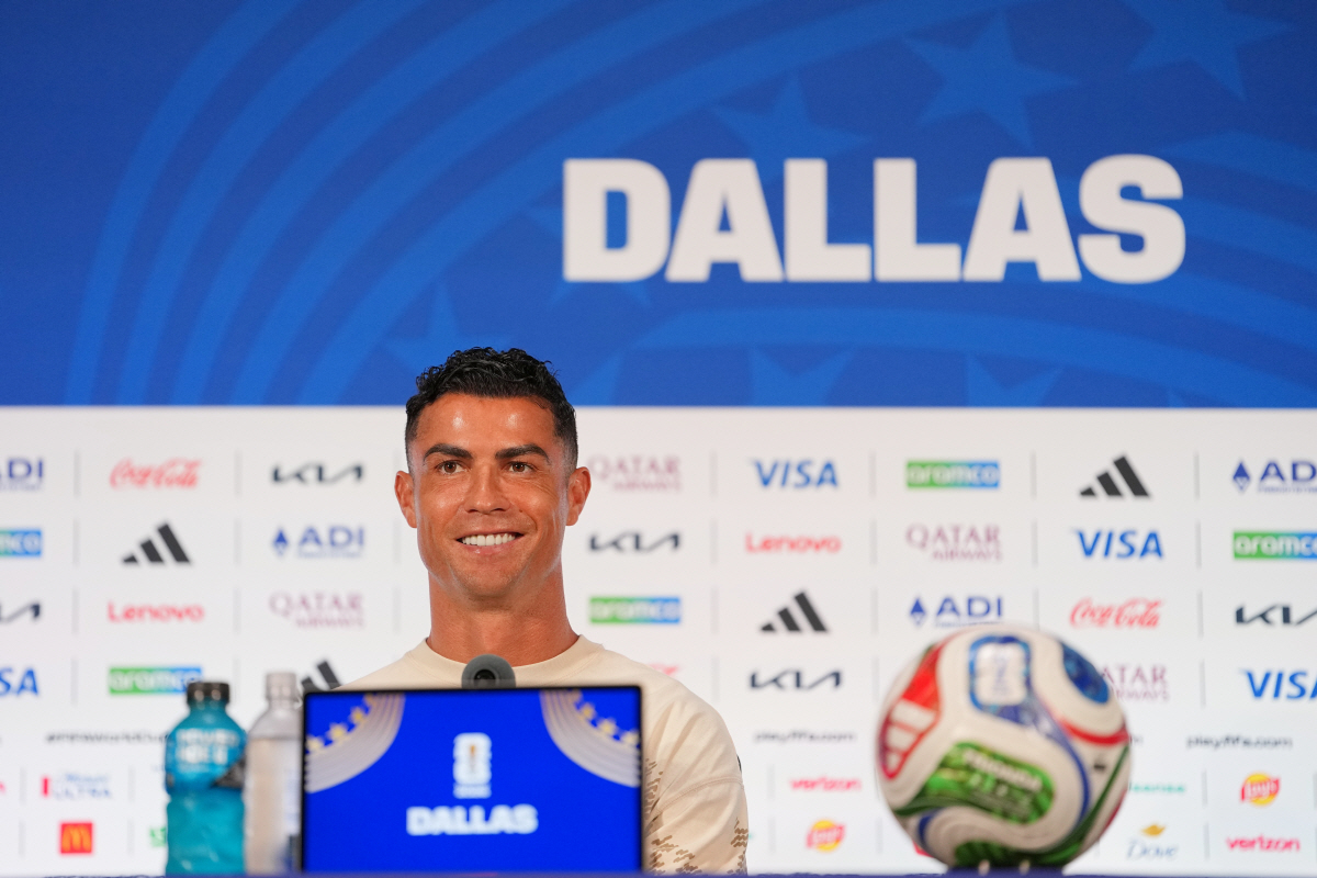 Portugal's Cristiano Ronaldo speaks to reporters during a press conference ahead of his team's World Cup round of 16 soccer match against Spain, Sunday, July 5, 2026, in Arlington, Texas, near Dallas. (AP Photo/Julio Cortez)