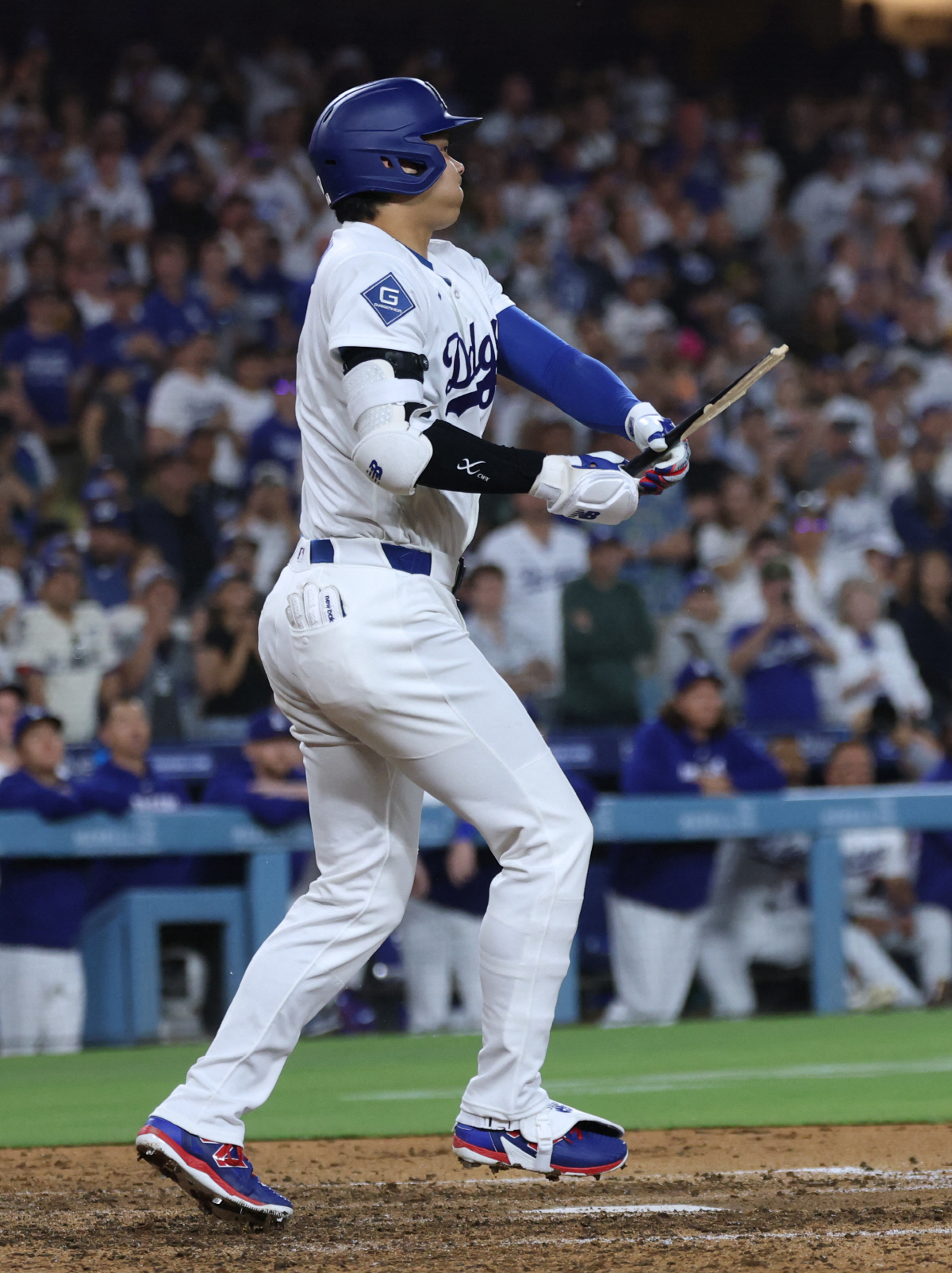 LOS ANGELES, CALIFORNIA - JULY 07: Shohei Ohtani #17 of the Los Angeles Dodgers breaks his bat on a pop fly for an out during the ninth inning against the Colorado Rockies at Dodger Stadium on July 07, 2026 in Los Angeles, California. Harry How/Getty Images/AFP (Photo by Harry How / GETTY IMAGES NORTH AMERICA / Getty Images via AFP)