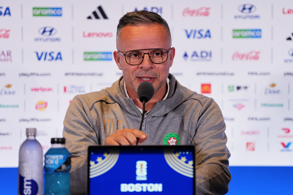 Morocco head coach Mohamed Ouahbi talks to the media during a press conference ahead of the World Cup quarterfinal soccer match between France and Morocco in Foxborough, Mass., near Boston, Wednesday, July 8, 2026. (AP Photo/Martin Meissner)