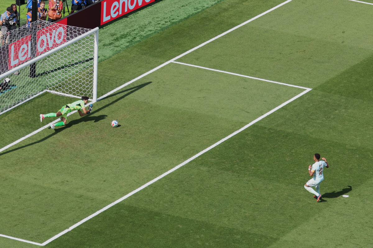 Morocco goalkeeper Yassine Bounou (1) stops a penalty kick against France's Kylian Mbappe (10) during the World Cup quarterfinal soccer match in Foxborough, Mass., near Boston, Thursday, July 9, 2026. (AP Photo/Mark Stockwell)