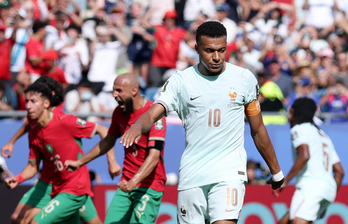 Soccer Football - FIFA World Cup 2026 - Quarter Final - France v Morocco - Boston Stadium, Foxborough, Massachusetts, U.S. - July 9, 2026 France's Kylian Mbappe looks dejected after he has his penalty saved by Morocco's Yassine Bounou REUTERS/Paul Childs