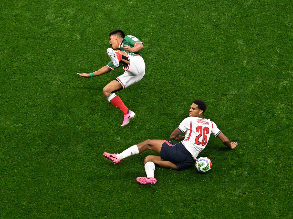 (260706) -- MEXICO CITY, July 6, 2026 (Xinhua) -- Jesus Gallardo (L) of Mexico is fouled by Jarell Quansah of England, then Quansah is sent off with a red card during the round of 16 match between Mexico and England at the 2026 FIFA World Cup at the Mexico City Stadium, Mexico, July 5, 2026. (Xinhua/Li Muzi)