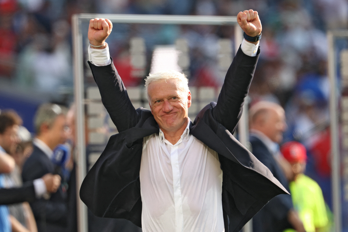 France's head coach Didier Deschamps celebrates after winning the 2026 World Cup football tournament quarter-final match between France and Morocco at Boston Stadium in Foxborough on July 9, 2026. (Photo by Odd ANDERSEN / AFP)