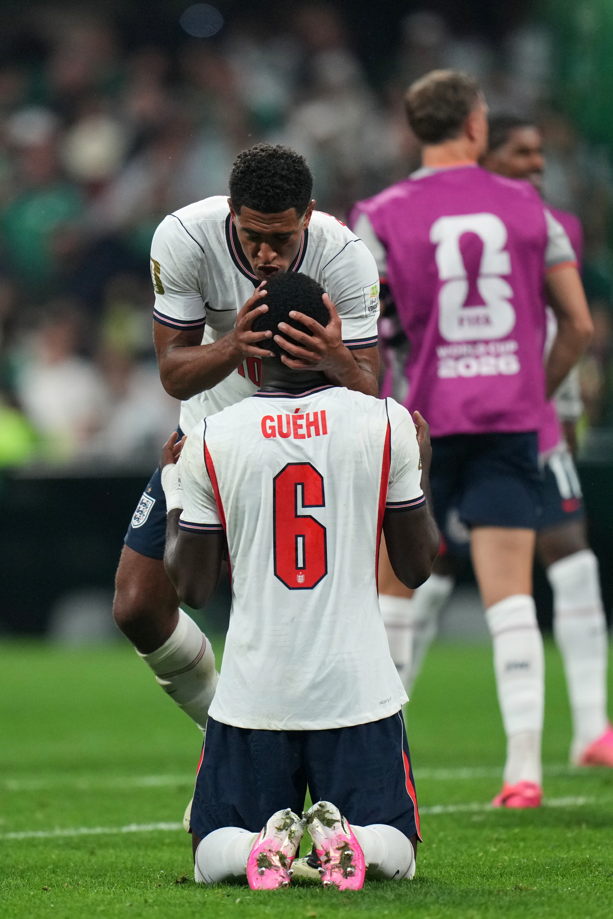 England's Jude Bellingham and Marc Guehi react at the the end of the World Cup round of 16 soccer match between Mexico and England in Mexico City, Sunday, July 5, 2026. (AP Photo/Silvia Izquierdo)