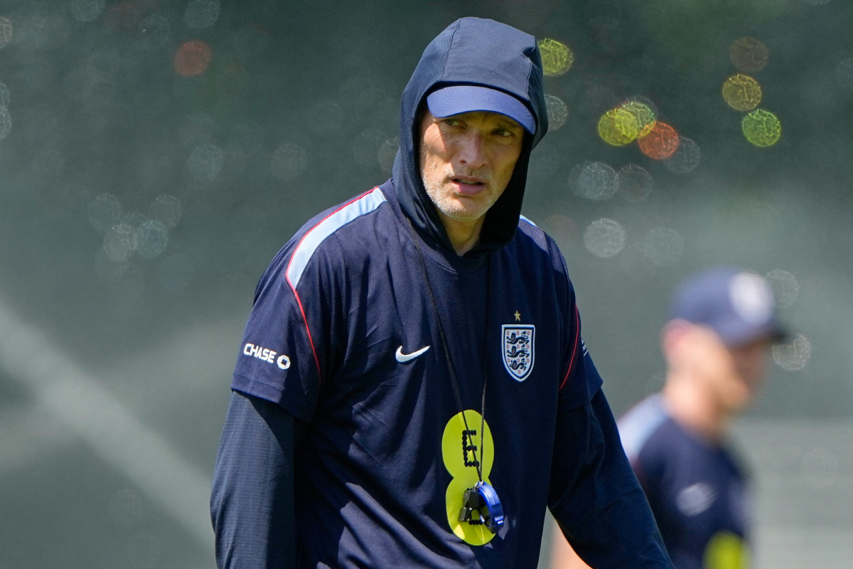 England head coach Thomas Tuchel watches training for the World Cup soccer tournament Wednesday, July 8, 2026, in Kansas City, Mo. (AP Photo/Charlie Riedel)
