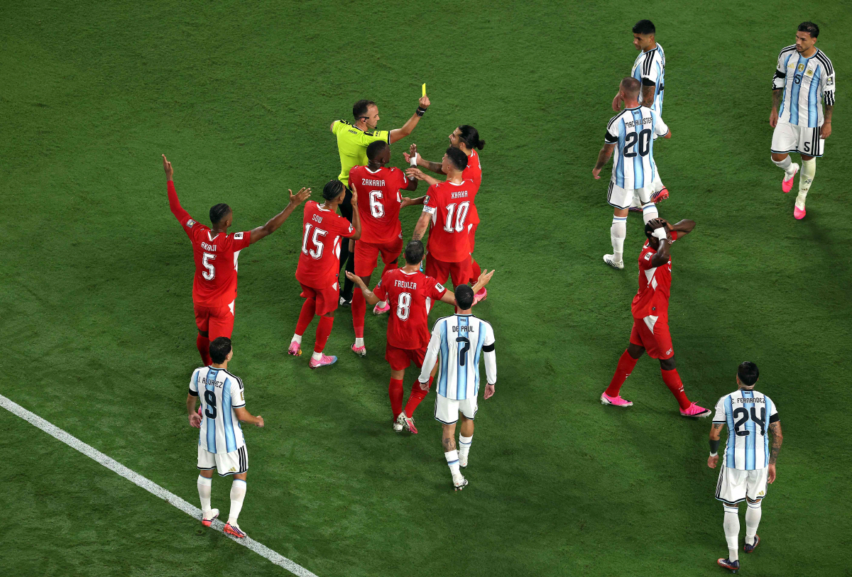 KANSAS CITY, MISSOURI - JULY 11: Referee Joao Pinheiro shows a second yellow card to Breel Embolo #7 of Switzerland during the FIFA World Cup 2026 Quarter Final match between Argentina and Switzerland at Kansas City Stadium on July 11, 2026 in Kansas City, Missouri. The yellow is Embolo's second, and is followed with a red card. Luke Hales/Getty Images/AFP (Photo by Luke Hales / GETTY IMAGES NORTH AMERICA / Getty Images via AFP)