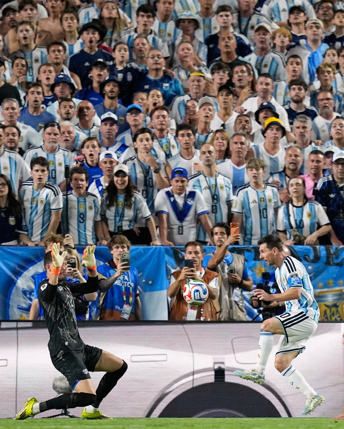 Argentina's Lionel Messi (10) has his shot at goal blocked by Switzerland goalkeeper Gregor Kobel (1) during the World Cup quarterfinal soccer match between Argentina and Switzerland in Kansas City, Mo., Saturday, July 11, 2026. (AP Photo/Ashley Landis)