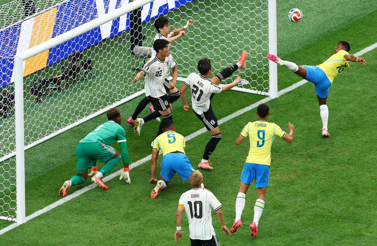 Soccer Football - FIFA World Cup 2026 - Round of 32 - Brazil v Japan - Houston Stadium, Houston, Texas, U.S. - June 29, 2026 Japan's Hiroki Ito in action with Brazil's Endrick REUTERS/Pedro Nunes
