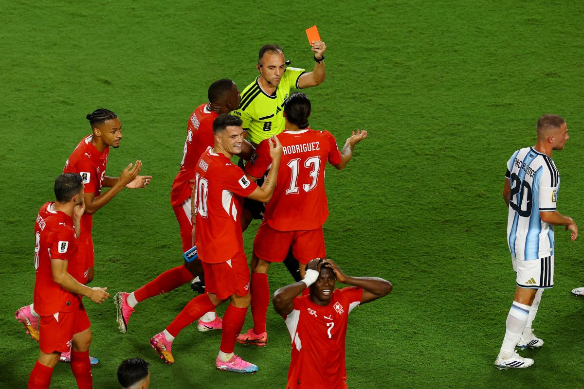 Soccer Football - FIFA World Cup 2026 - Quarter Final - Argentina v Switzerland - Kansas City Stadium, Kansas City, Missouri, U.S. - July 11, 2026 Switzerland's Breel Embolo is shown a red card by referee Joao Pinheiro after a VAR review REUTERS/Albert Gea