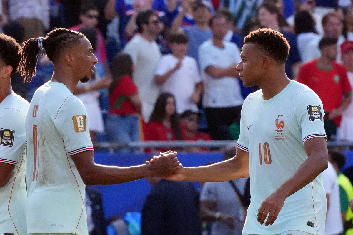 Soccer Football - FIFA World Cup 2026 - Quarter Final - France v Morocco - Boston Stadium, Foxborough, Massachusetts, U.S. - July 9, 2026 France's Kylian Mbappe shakes hands with Michael Olise after the match IMAGN IMAGES via Reuters/David Butler Ii
