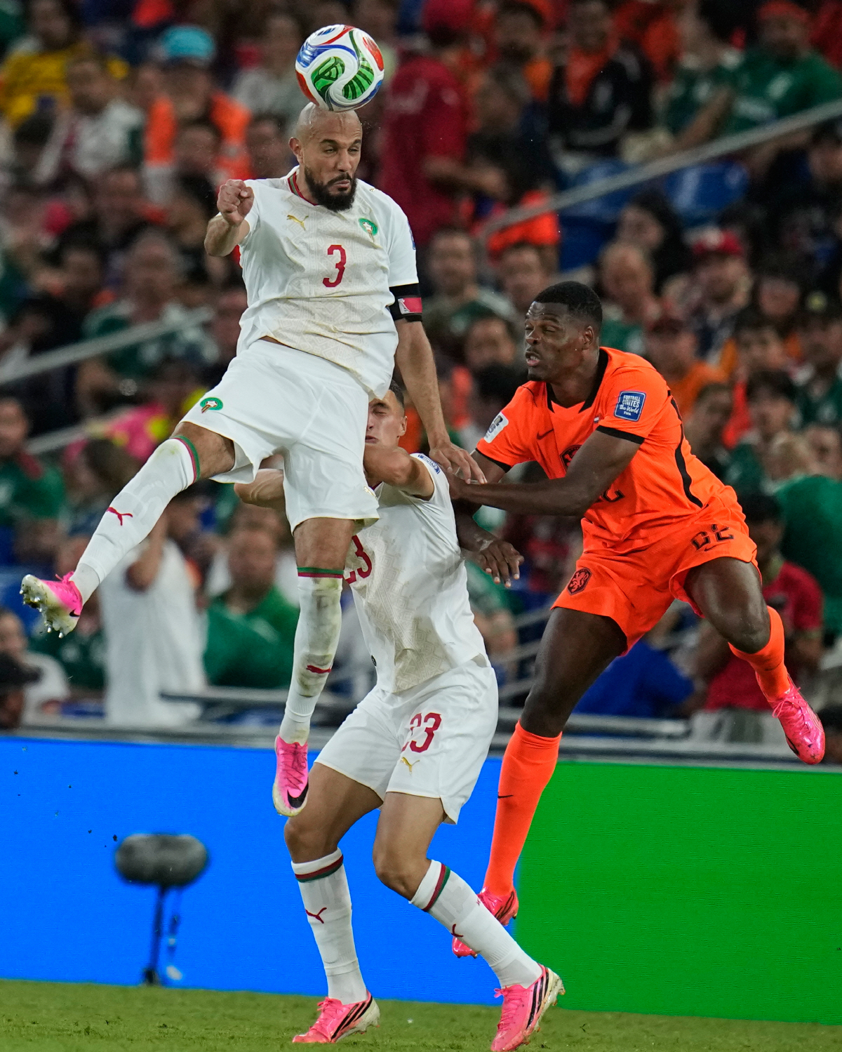 Morocco's Noussair Mazraoui (3) heads the ball during the World Cup round of 32 soccer match between the Netherlands and Morocco in Guadalupe, near Monterrey, Mexico, Monday, June 29, 2026. (AP Photo/Ricardo Mazalan)
