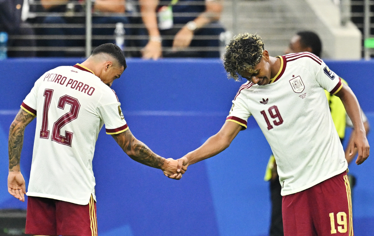 Soccer Football - FIFA World Cup 2026 - Semi Final - France v Spain - Dallas Stadium, Arlington, Texas, U.S. - July 14, 2026 Spain's Pedro Porro celebrates scoring their second goal with teammate Lamine Yamal IMAGN IMAGES via Reuters/Maria Lysaker