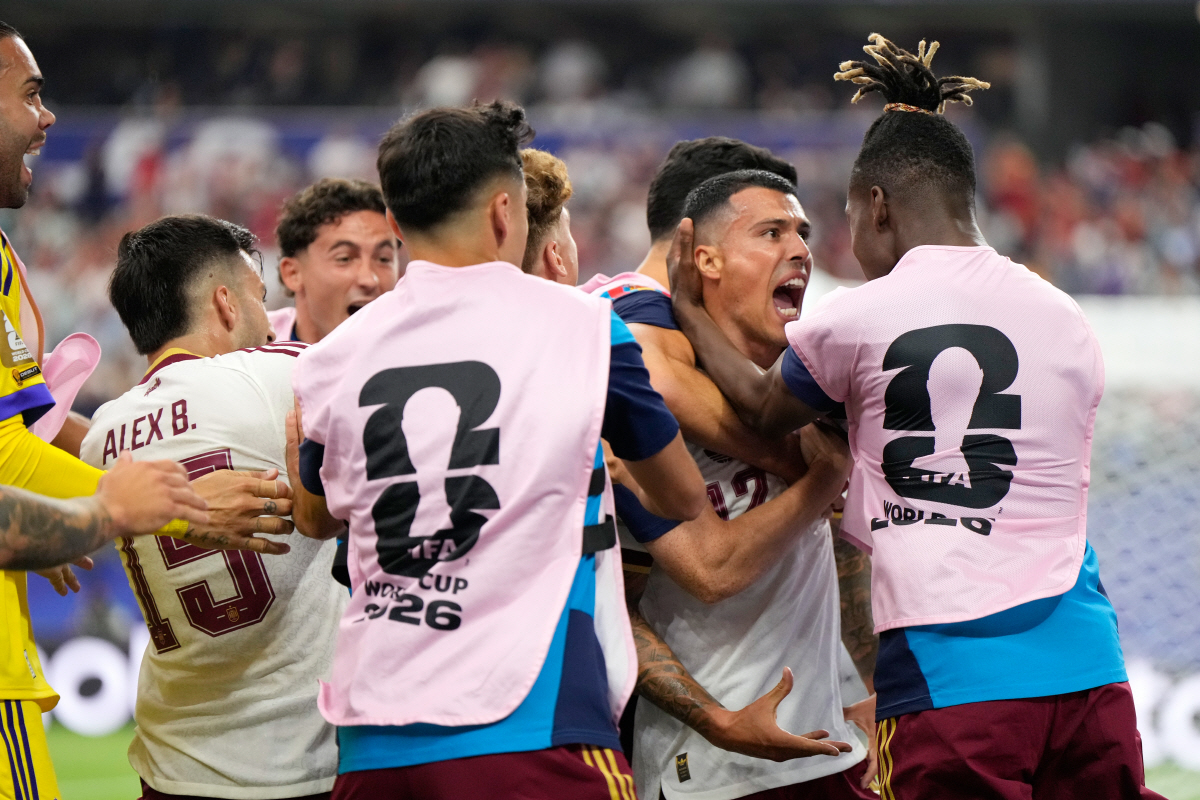 Spain's Pedro Porro celebrates with Spain's Nico Williams, right, after scoring his side's second goal during the World Cup semifinal soccer match between France and Spain in Arlington, Texas, near Dallas, Tuesday, July 14, 2026. (AP Photo/Ashley Landis)