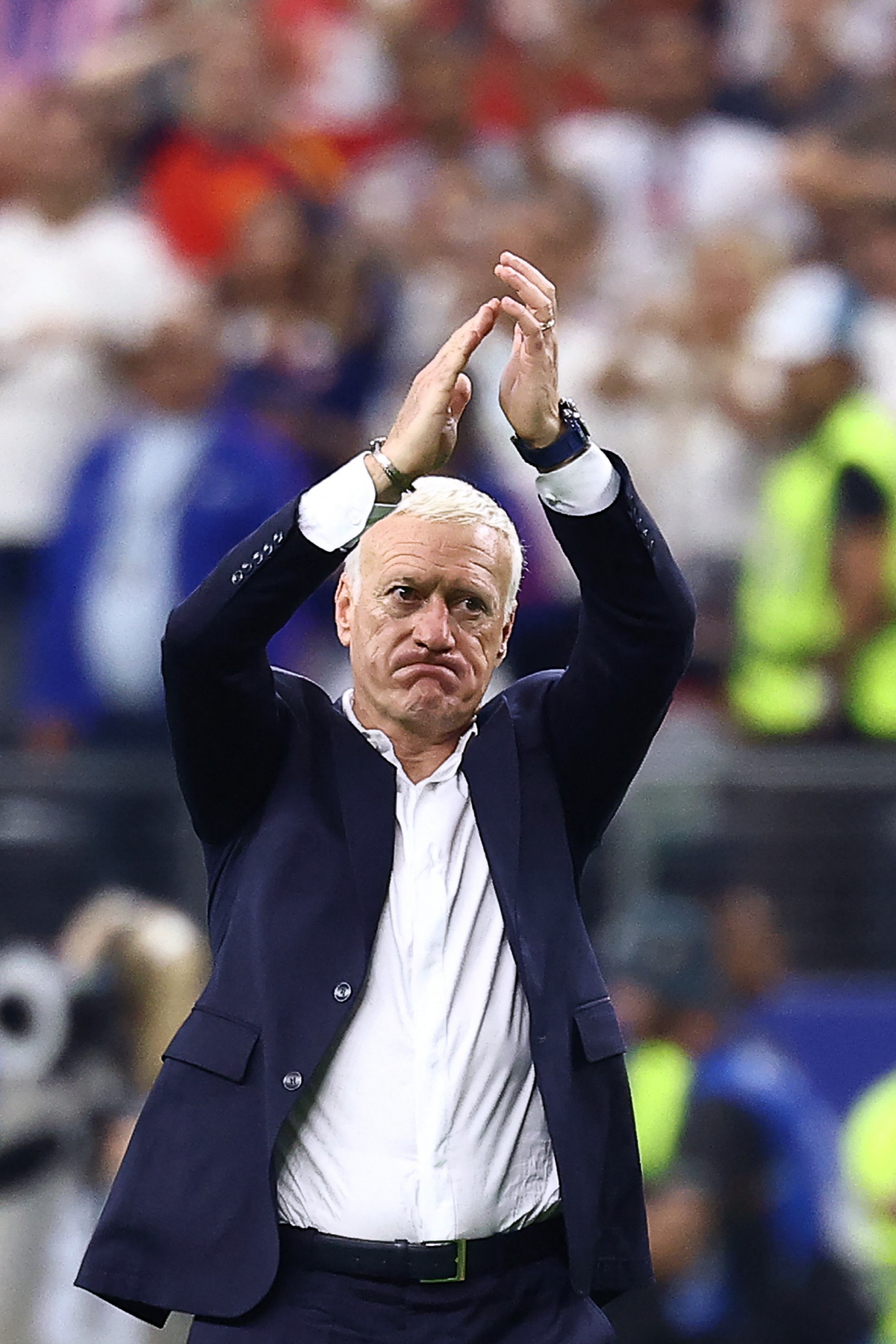 France's head coach Didier Deschamps reacts after losing the 2026 World Cup football tournament semi-final match between France and Spain at the Dallas Stadium in Arlington on July 14, 2026. (Photo by CHARLY TRIBALLEAU / AFP)