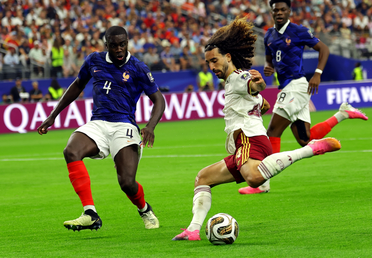 epa13111518 Dayot Upamecano of France (L) and Marc Cucurella of Spain in action during the FIFA World Cup 2026 semifinals match France against Spain, in Dallas, USA, 14 July 2026. EPA/CHRISTOPHER NEUNDORF
