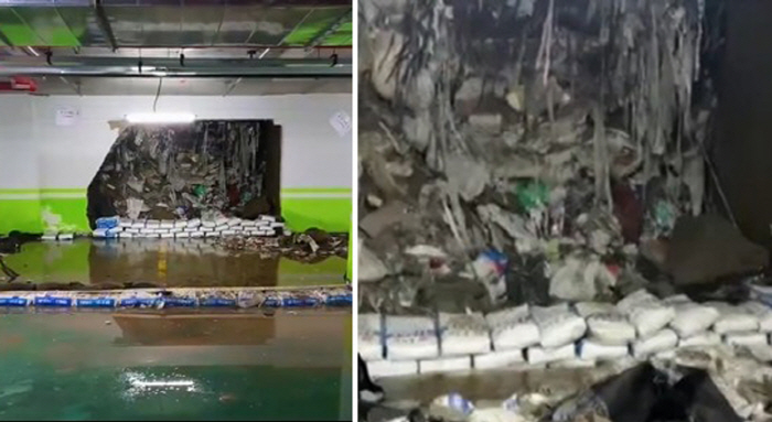 Heavy Rain Collapses Basement Parking Garage Wall, Exposing Piles of Trash... Concerns Over Poor Construction Grow