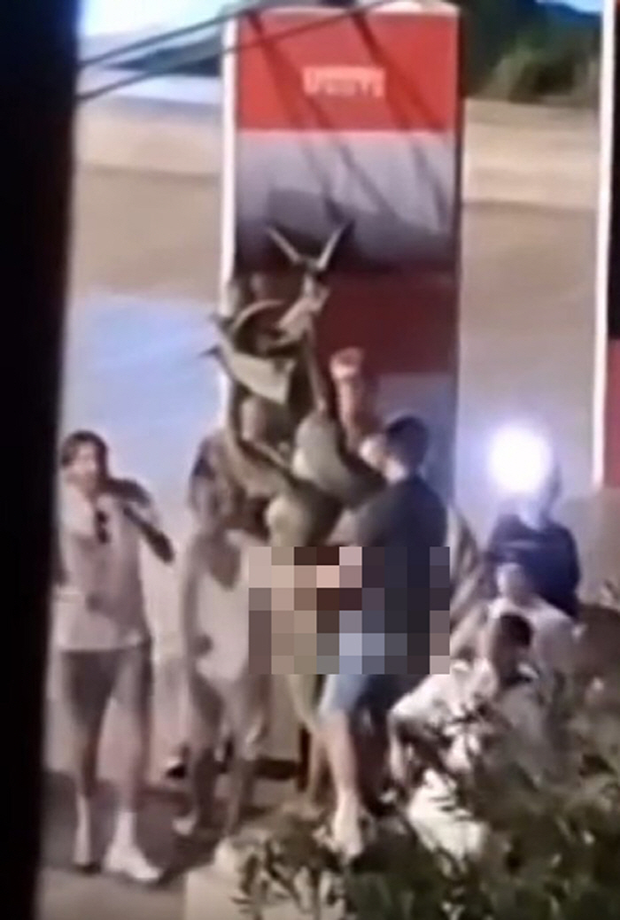 'Tourists Spark Outrage After Obscene Act at Terror Victims' Memorial'