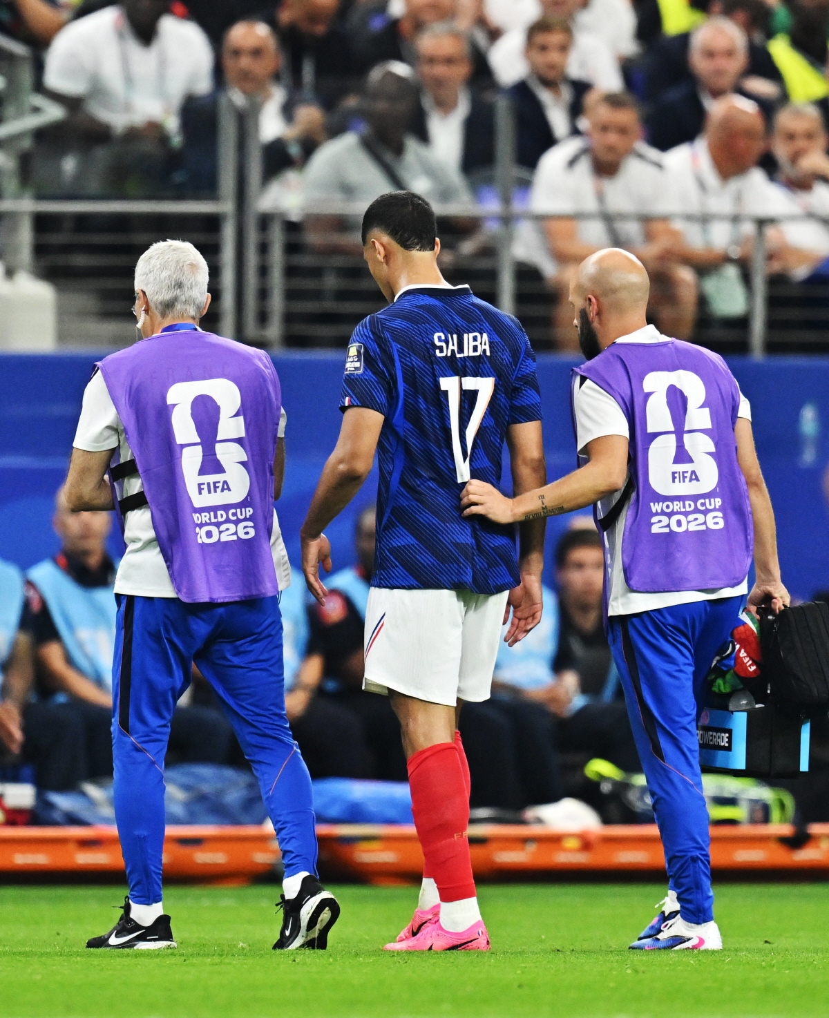 Soccer Football - FIFA World Cup 2026 - Semi Final - France v Spain - Dallas Stadium, Arlington, Texas, U.S. - July 14, 2026 France's William Saliba leaves the pitch after sustaining an injury IMAGN IMAGES via Reuters/Maria Lysaker
