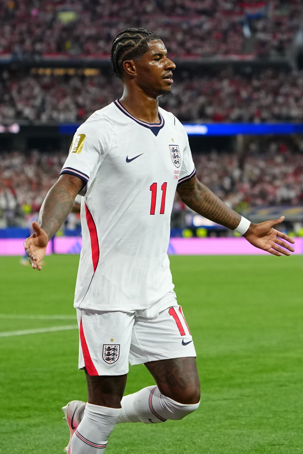 England's Marcus Rashford celebrates scoring his side's 4th goal during the World Cup Group L soccer match between England and Croatia in Arlington, Texas, near Dallas, Wednesday, June 17, 2026. (AP Photo/Julio Cortez)