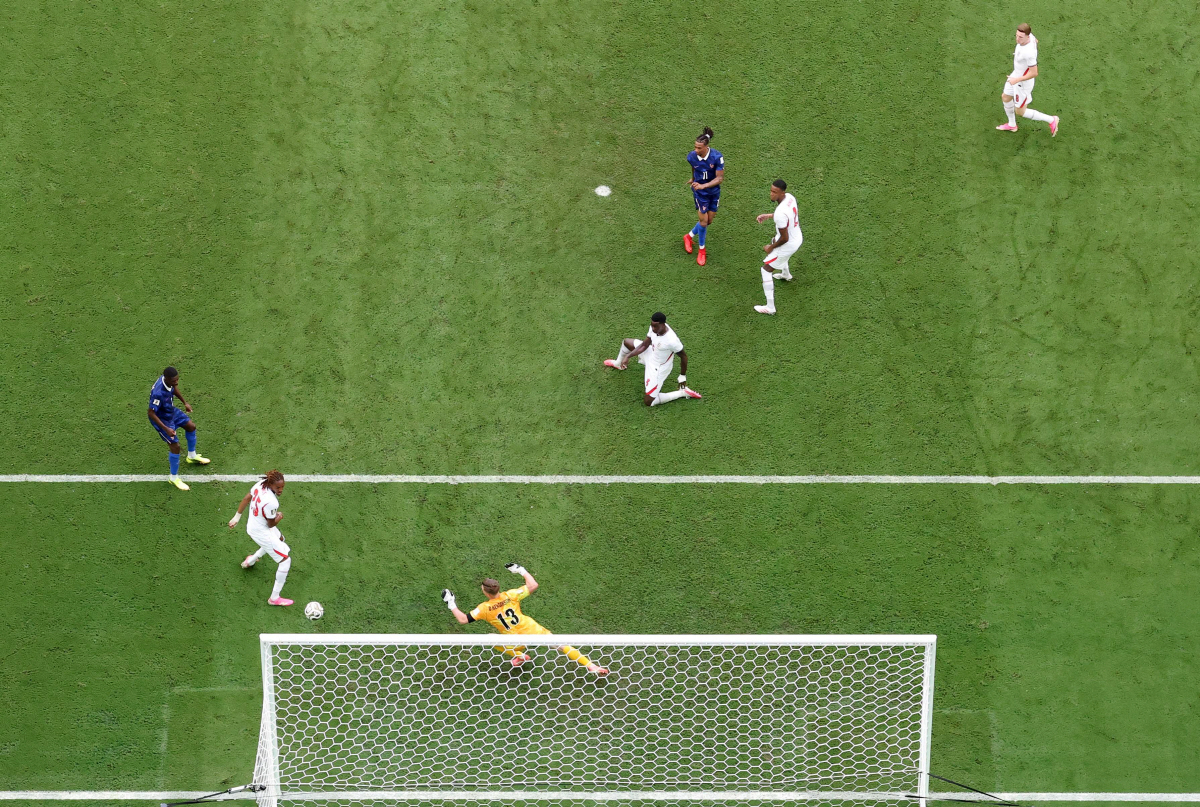 MIAMI GARDENS, FLORIDA - JULY 18: (EDITOR'S NOTE: Image was captured using a remote camera positioned above the field of play.) Michael Olise #11 of France shoots and miss during the FIFA World Cup 2026 Bronze Final between France and England at Miami Stadium on July 18, 2026 in Miami Gardens, Florida. Buda Mendes/Getty Images/AFP (Photo by Buda Mendes / GETTY IMAGES NORTH AMERICA / Getty Images via AFP)