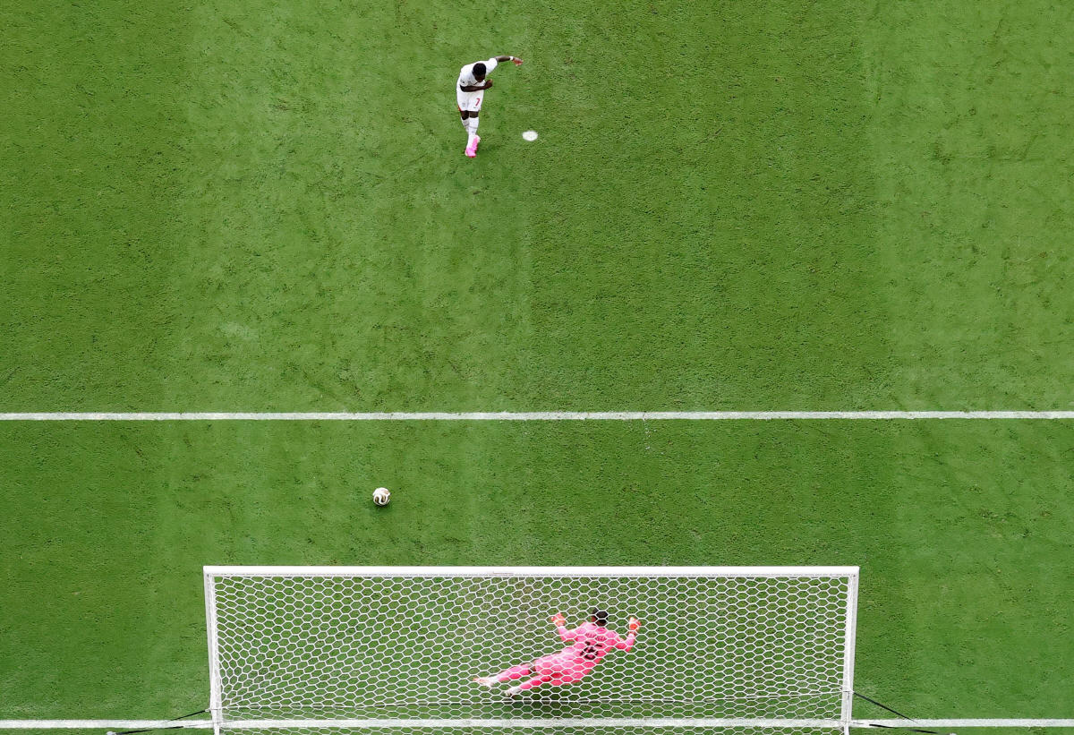 MIAMI GARDENS, FLORIDA - JULY 18: (EDITORS NOTE: Image was captured using a remote camera positioned above the field of play.) Bukayo Saka #7 of England scores his team's fifth goal and his hat trick goal from the penalty spot during the FIFA World Cup 2026 Bronze Final between France and England at Miami Stadium on July 18, 2026 in Miami Gardens, Florida. Luke Hales/Getty Images/AFP (Photo by Luke Hales / GETTY IMAGES NORTH AMERICA / Getty Images via AFP)
