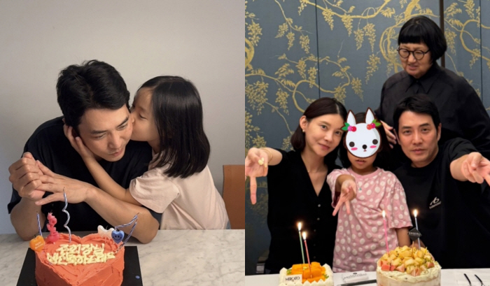 Joo Sang-wook beams after a kiss from his daughter at a lavish birthday party