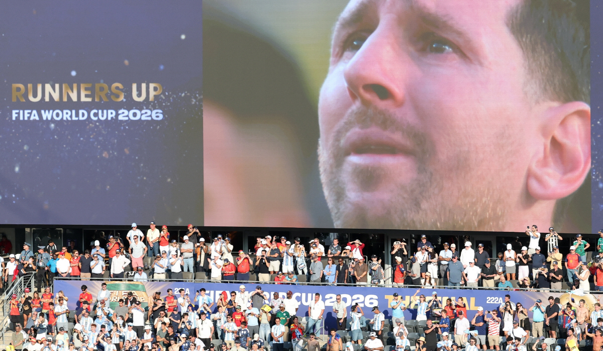 epa13121729 A display board shows an emotional Lionel Messi of Argentina on screen during the awards ceremony after the FIFA World Cup 2026 final match Spain against Argentina, in New Jersey, USA, 19 July 2026. EPA/SARAH YENESEL