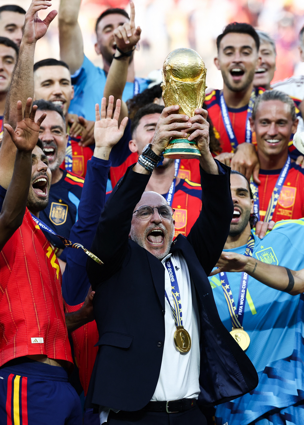 Spain's head coach Luis de la Fuente lifts the trophy after winning the 2026 World Cup football tournament final match between Spain and Argentina at the New York/New Jersey Stadium in East Rutherford on July 19, 2026. (Photo by FRANCK FIFE / AFP)