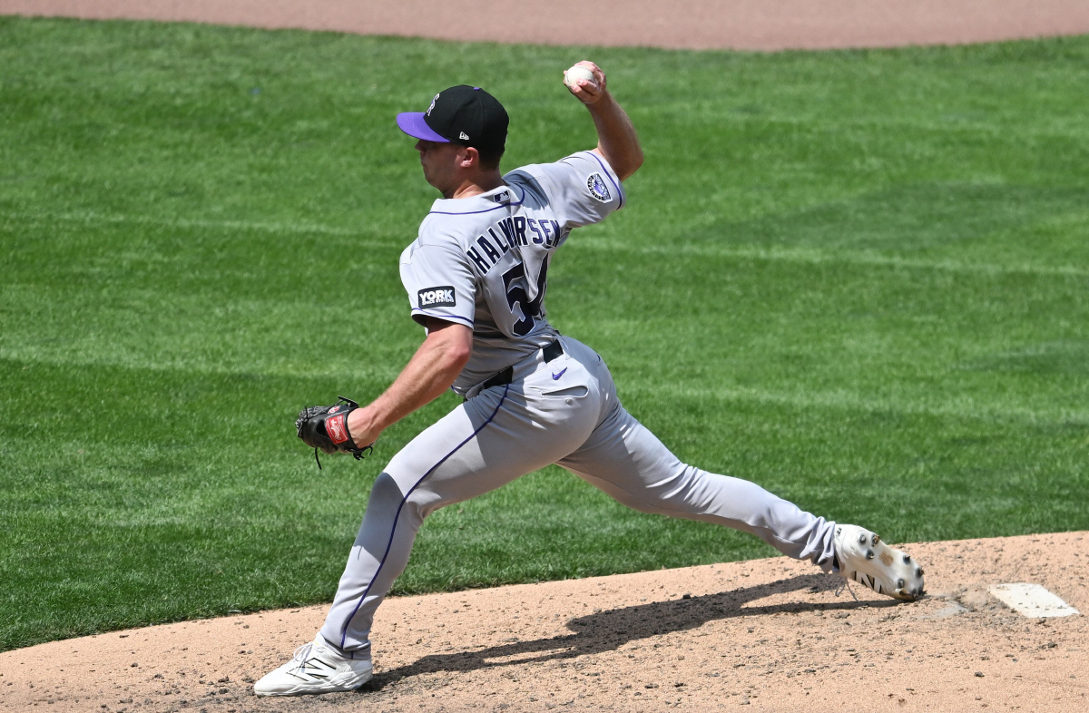 MINNEAPOLIS, MINNESOTA - JUNE 28: Seth Halvorsen #54 of the Colorado Rockies pitches against the Minnesota Twins during the seventh inning of the game at Target Field on June 28, 2026 in Minneapolis, Minnesota. Stephen Maturen/Getty Images/AFP (Photo by Stephen Maturen / GETTY IMAGES NORTH AMERICA / Getty Images via AFP)